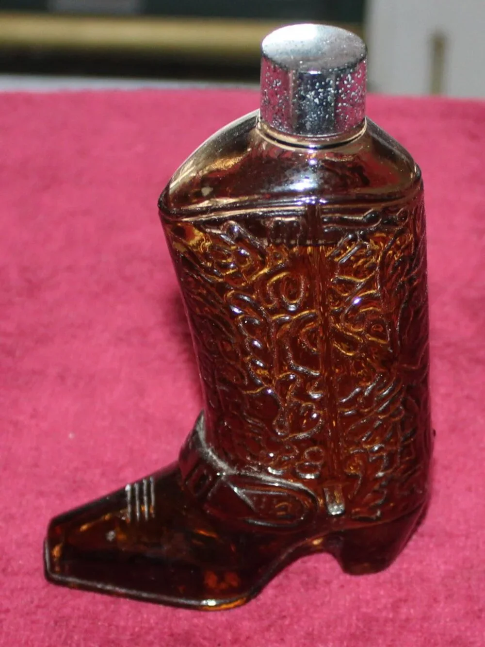 Vintage Avon Western Boot decanter featuring amber glass